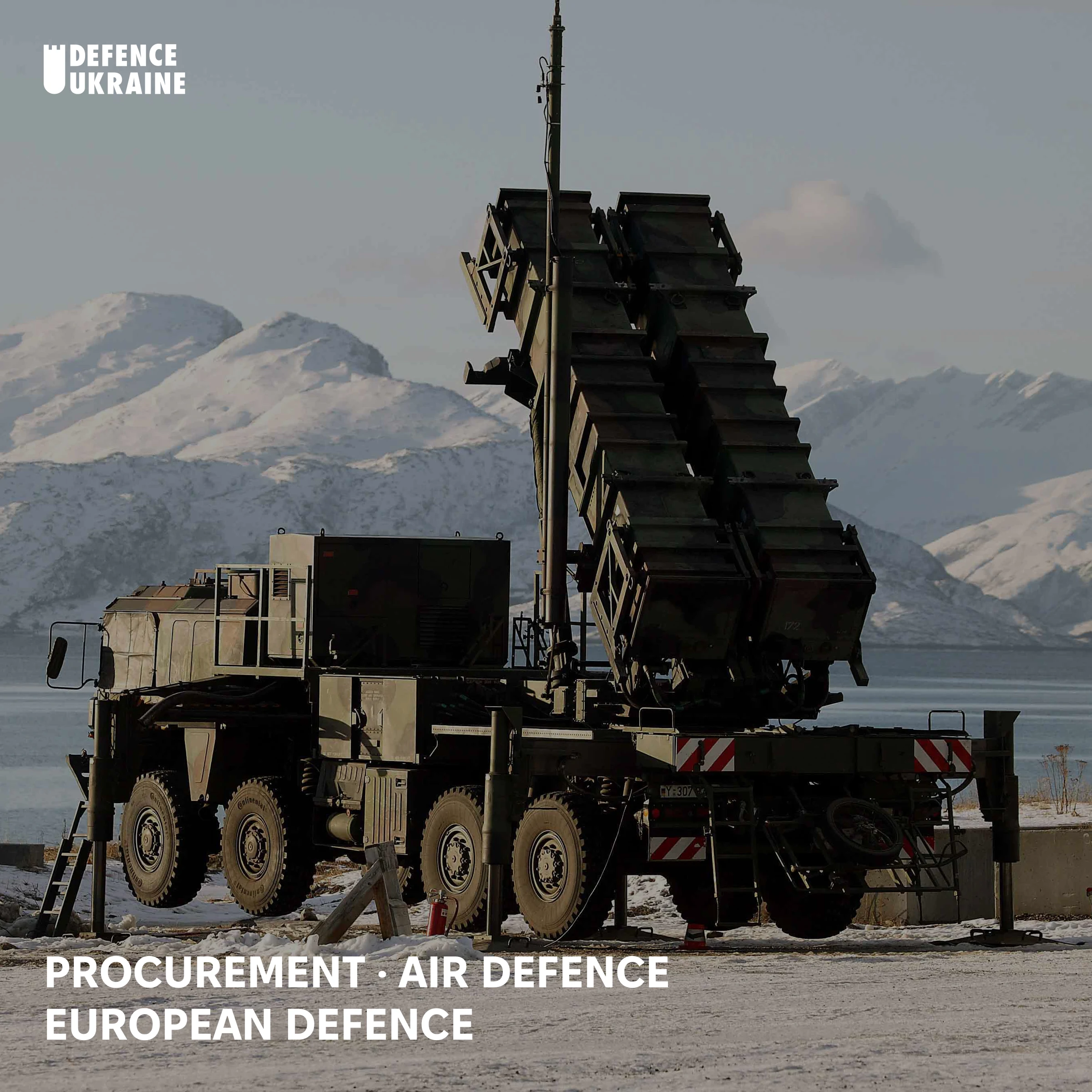 A German Bundeswehr Patriot launcher raised with four interceptor canisters at a snow-covered coastal site, the air-defence system at the centre of the EU's procurement origin-rule dispute.
