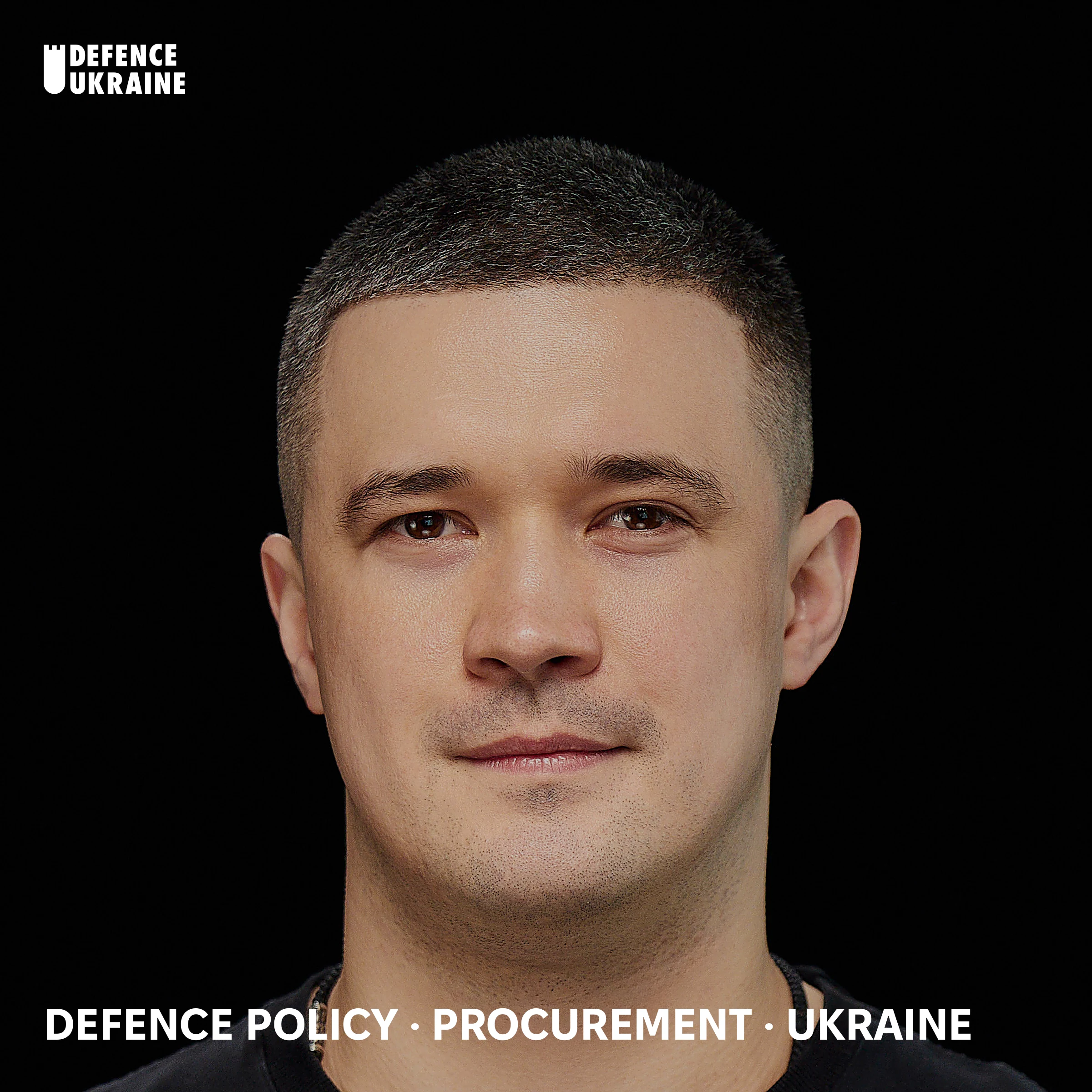 Portrait of Mykhailo Fedorov, Ukraine's Minister of Defence from 14 January to 16 July 2026 and previously Minister of Digital Transformation, photographed against a dark studio background.